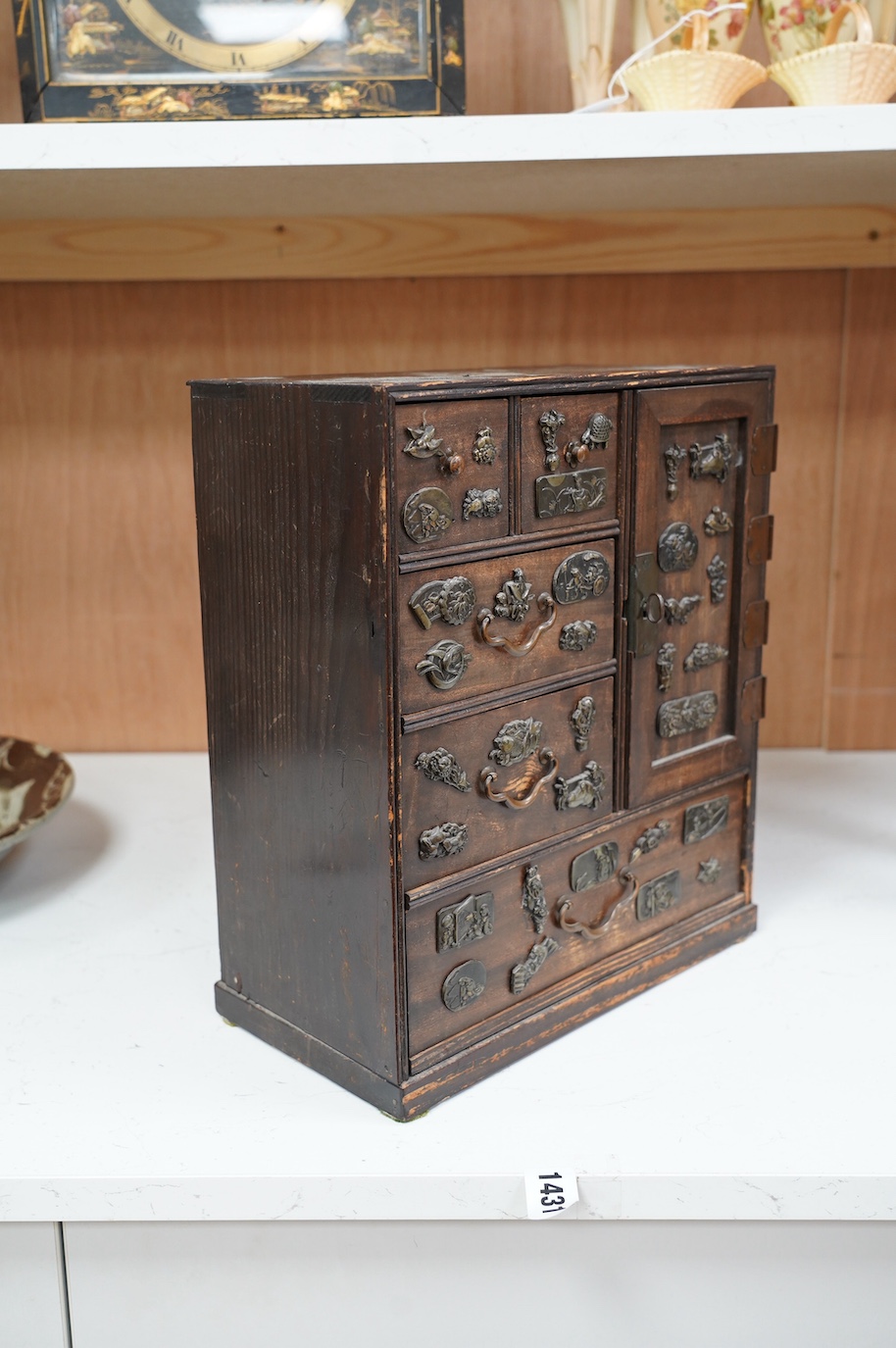 A late 19th century Japanese desk top dansu cabinet, 33.5x 29cm. Condition - fair